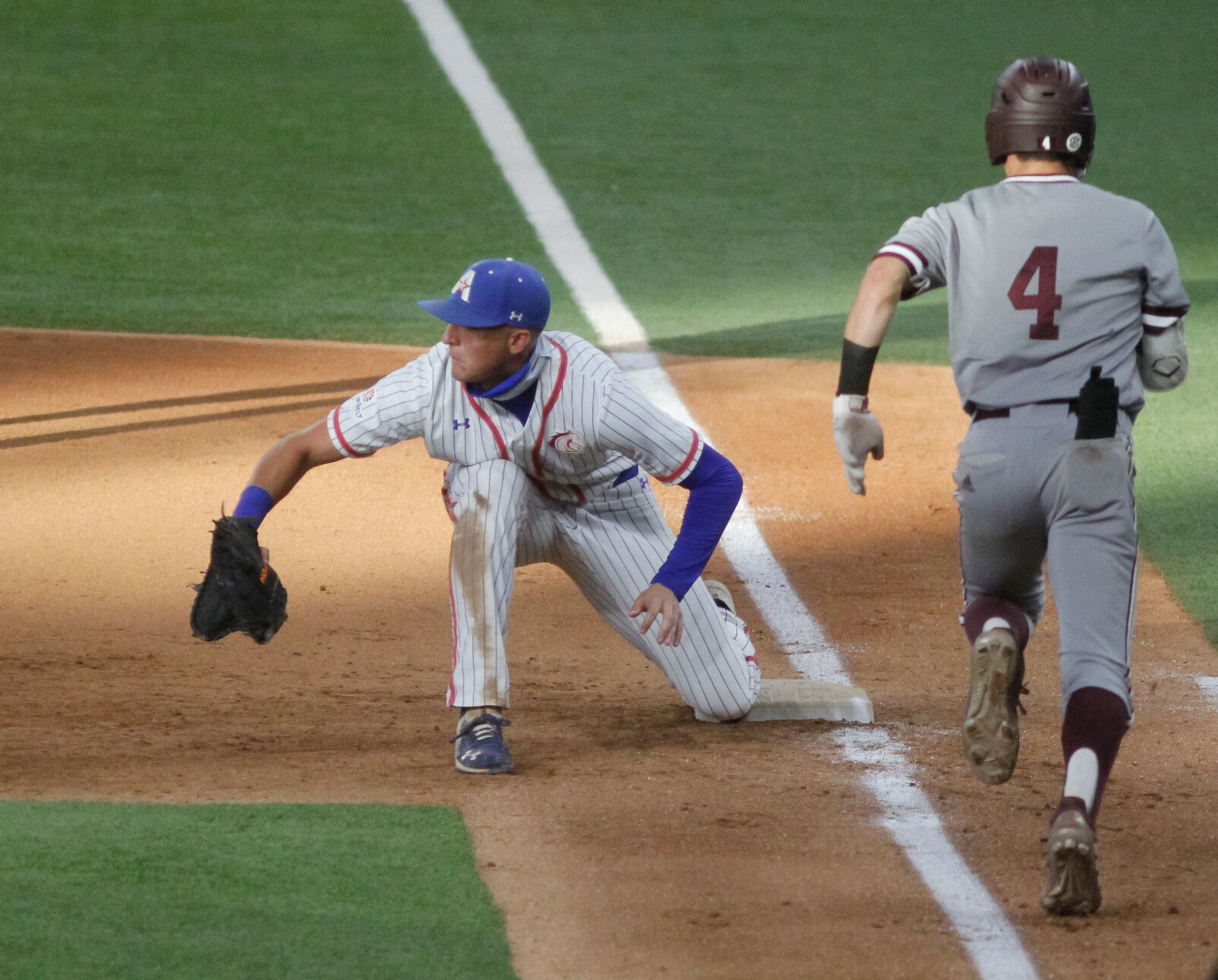 Photos: Mavericks lose 8-4 against Texas A&M University despite early lead